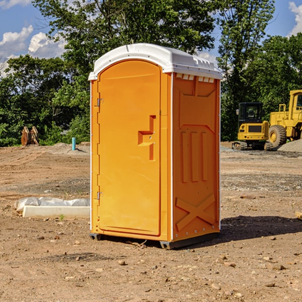 how often are the portable restrooms cleaned and serviced during a rental period in Gilman MN